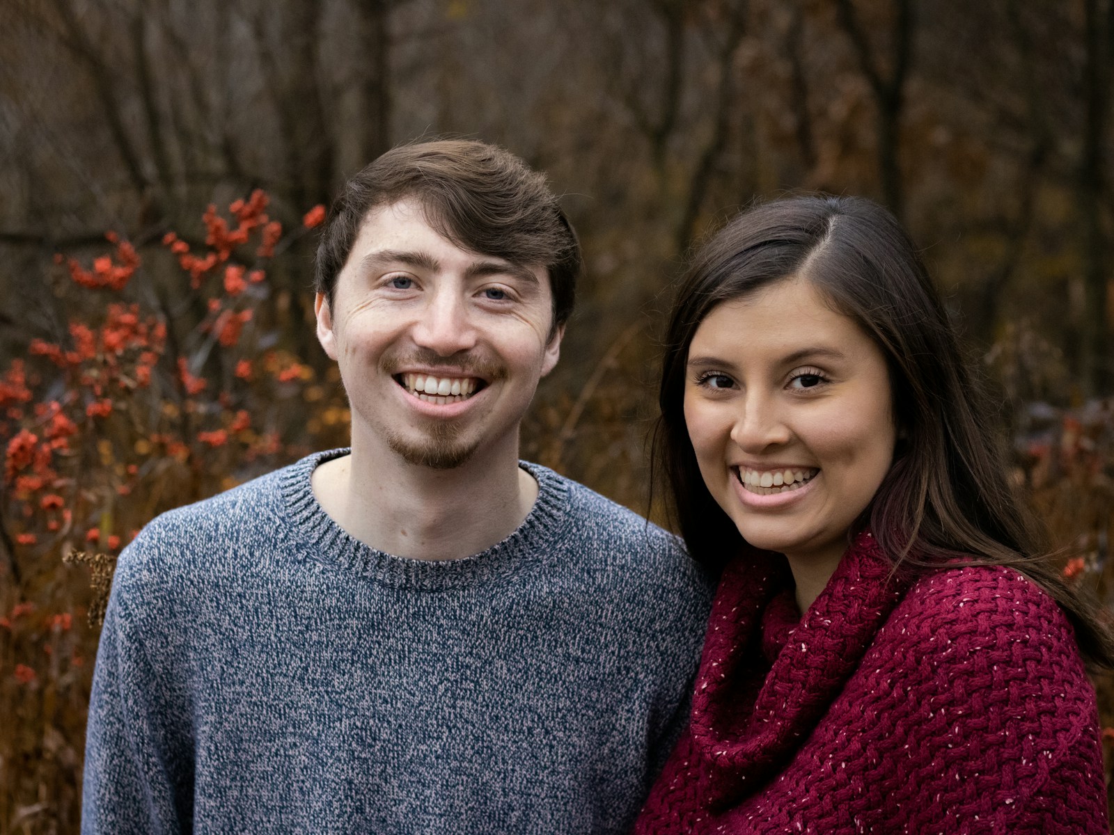 a man and a woman standing next to each other